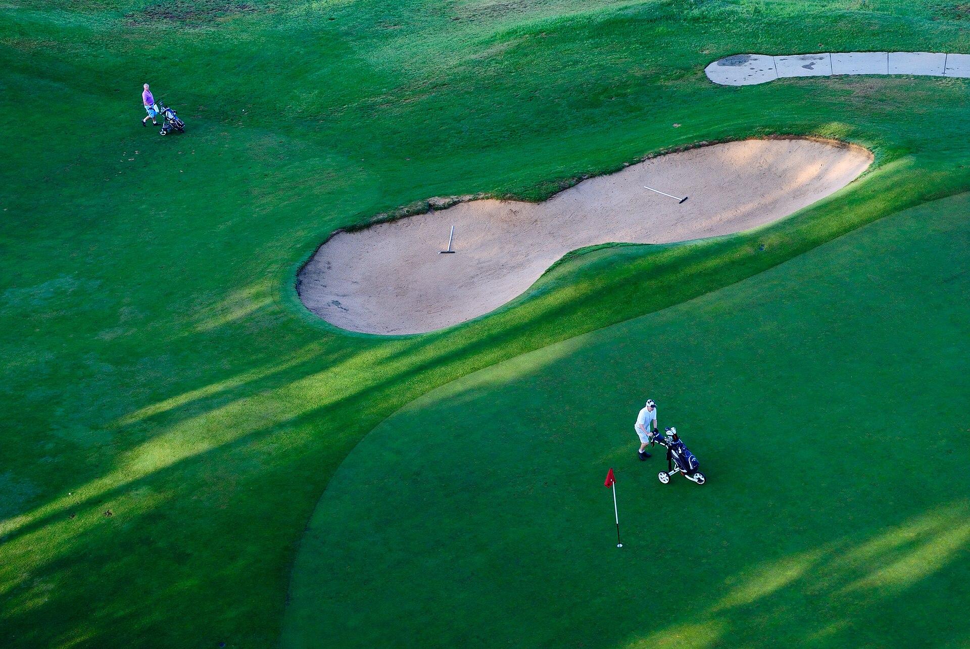 A well-maintained golf course putting green